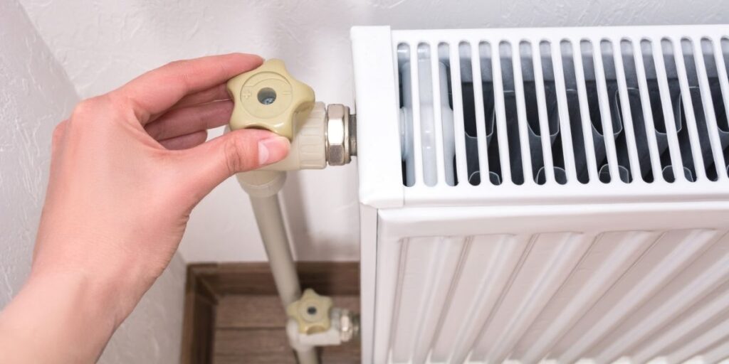 HVAC and repair experts in Sterling, VA performing heating system maintenance